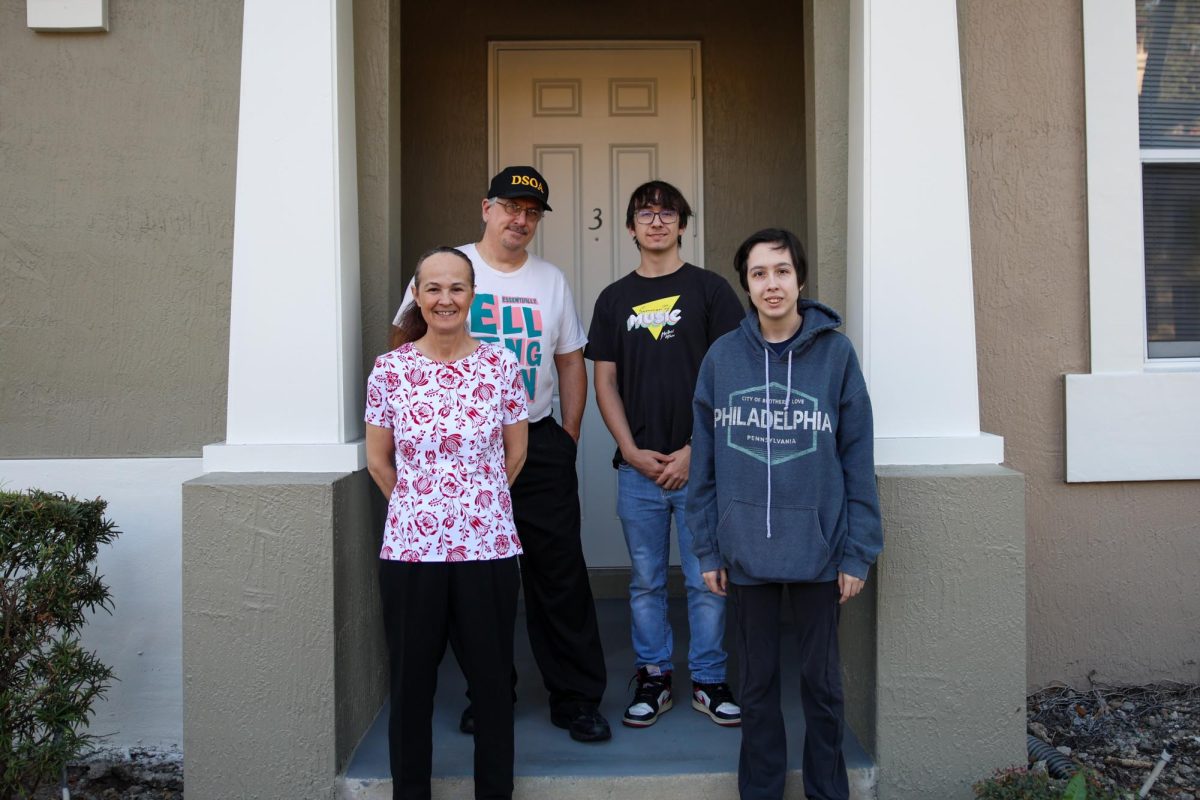 Michael Feuerborn and his family stand in front of their home. After receiving GoFundMe donations, the Feuerborns could repay their missed rent and secure another lease on the home. Michael said that the money they raised “guaranteed a roof over our head(s)."