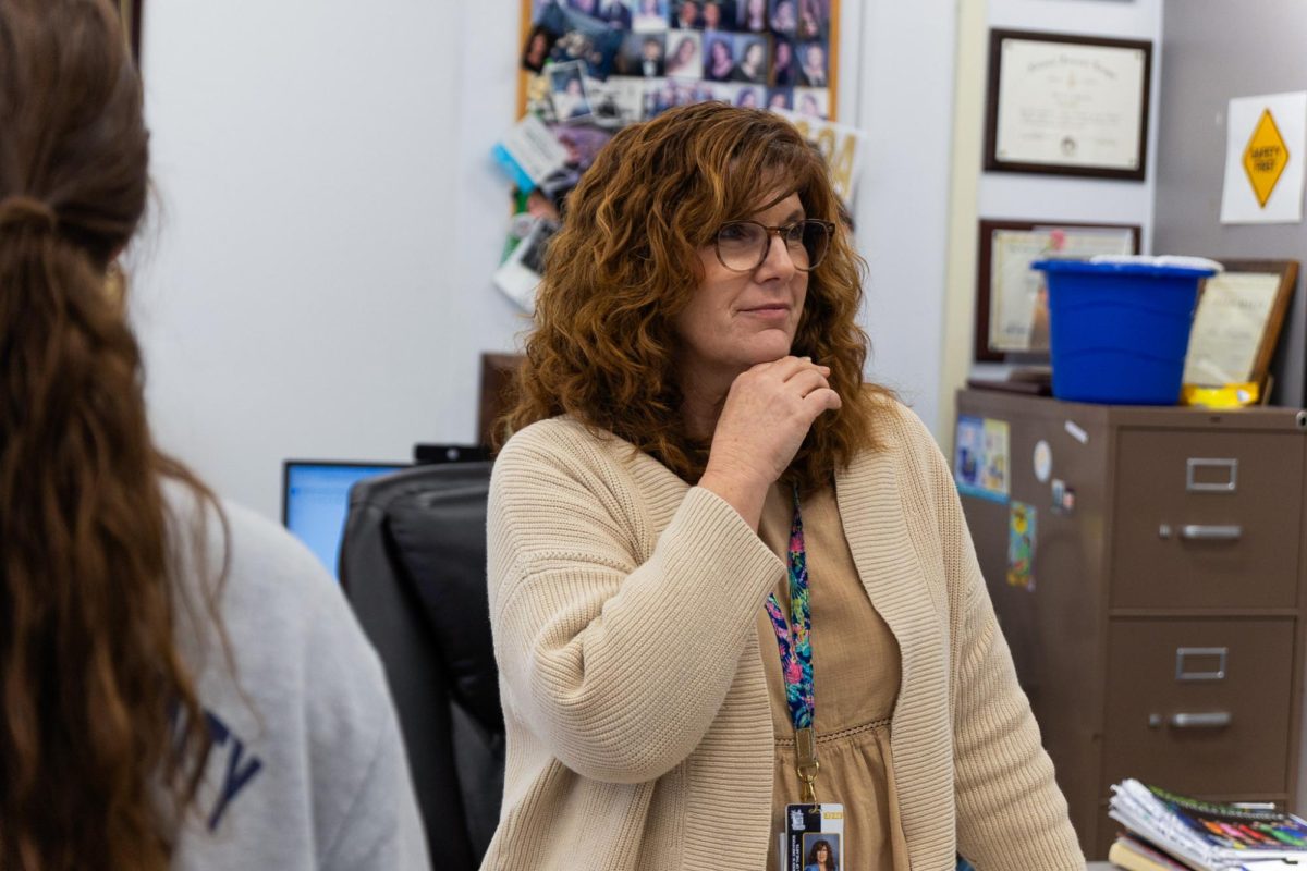  Engaging in conversation, speech and debate coach and communications teacher Angela Anyzeski, talks to her students about debate-related opportunities. This was Mrs. Anyzeski’s 26th year teaching at Dreyfoos.