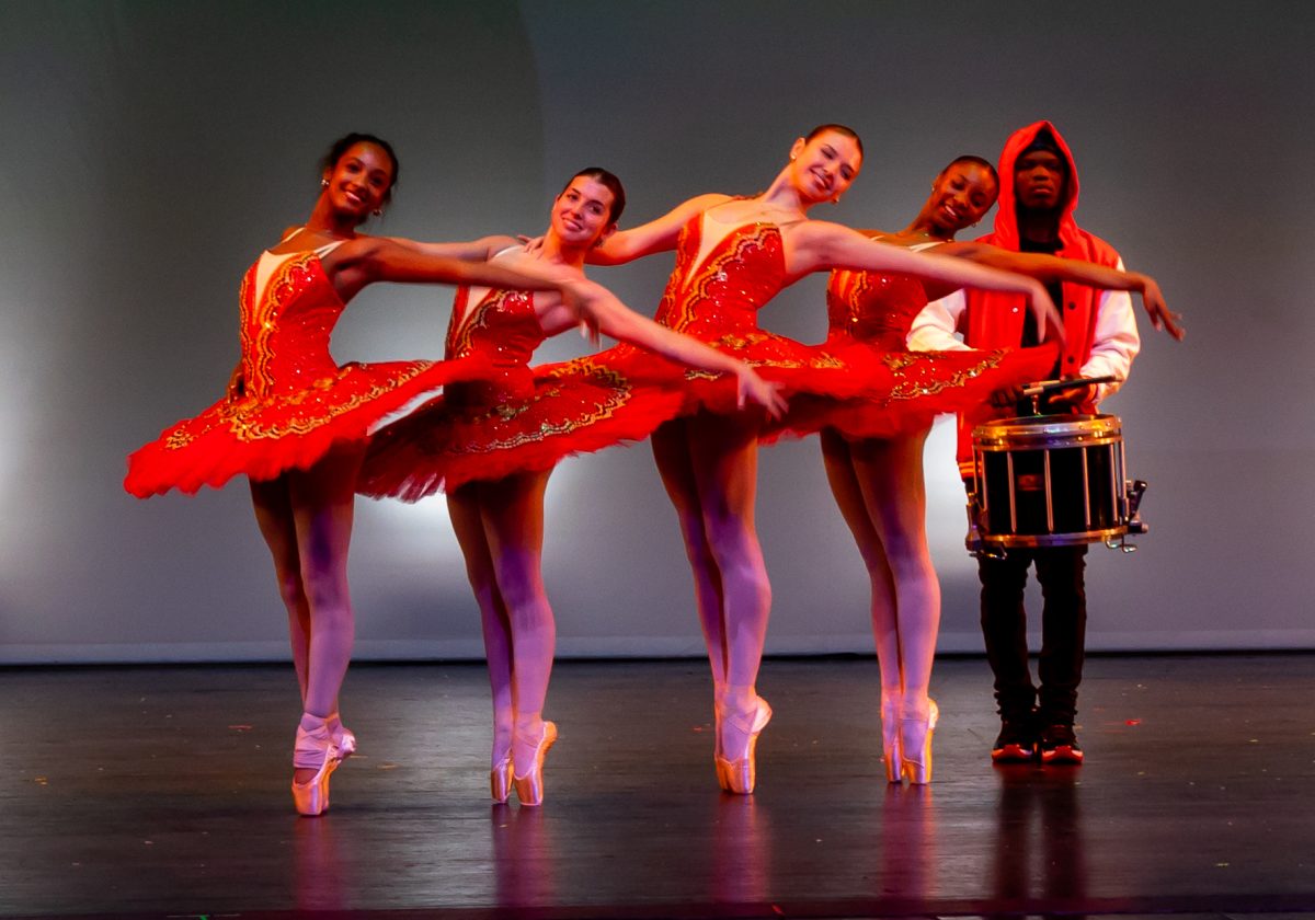 Holding an en pointe position, dance juniors (from left to right) Arielle Montpeirous, Lexi Gibson, Bianca Vasilescu, and Mackenna Bernard perform a ballet routine for the Black Student Union (BSU) showcase, which took place Feb. 4 in Meyer Hall. The dance was accompanied by band freshman Xachary Charles, who played the snare drum during the performance.  “I loved getting to watch all my friends perform their art areas and seeing all the talent from different majors,” said Gibson. “I think it connects back to a lot of history and has helped pave the way for us now.”  