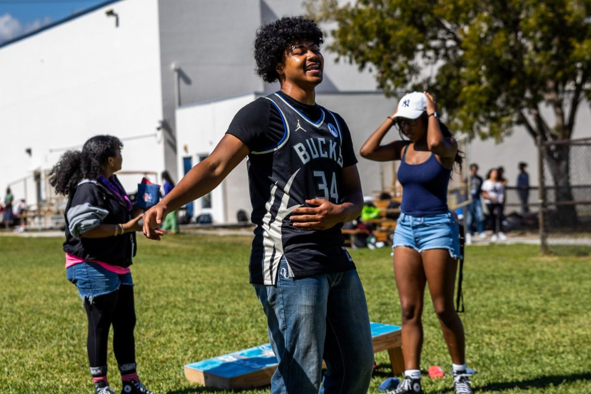 Singing “Water” by South African singer-songwriter Tyla, Black Student Union (BSU) co-president and digital media senior Tyson Jimerson celebrates the first day of BSU spirit week by participating in field day.