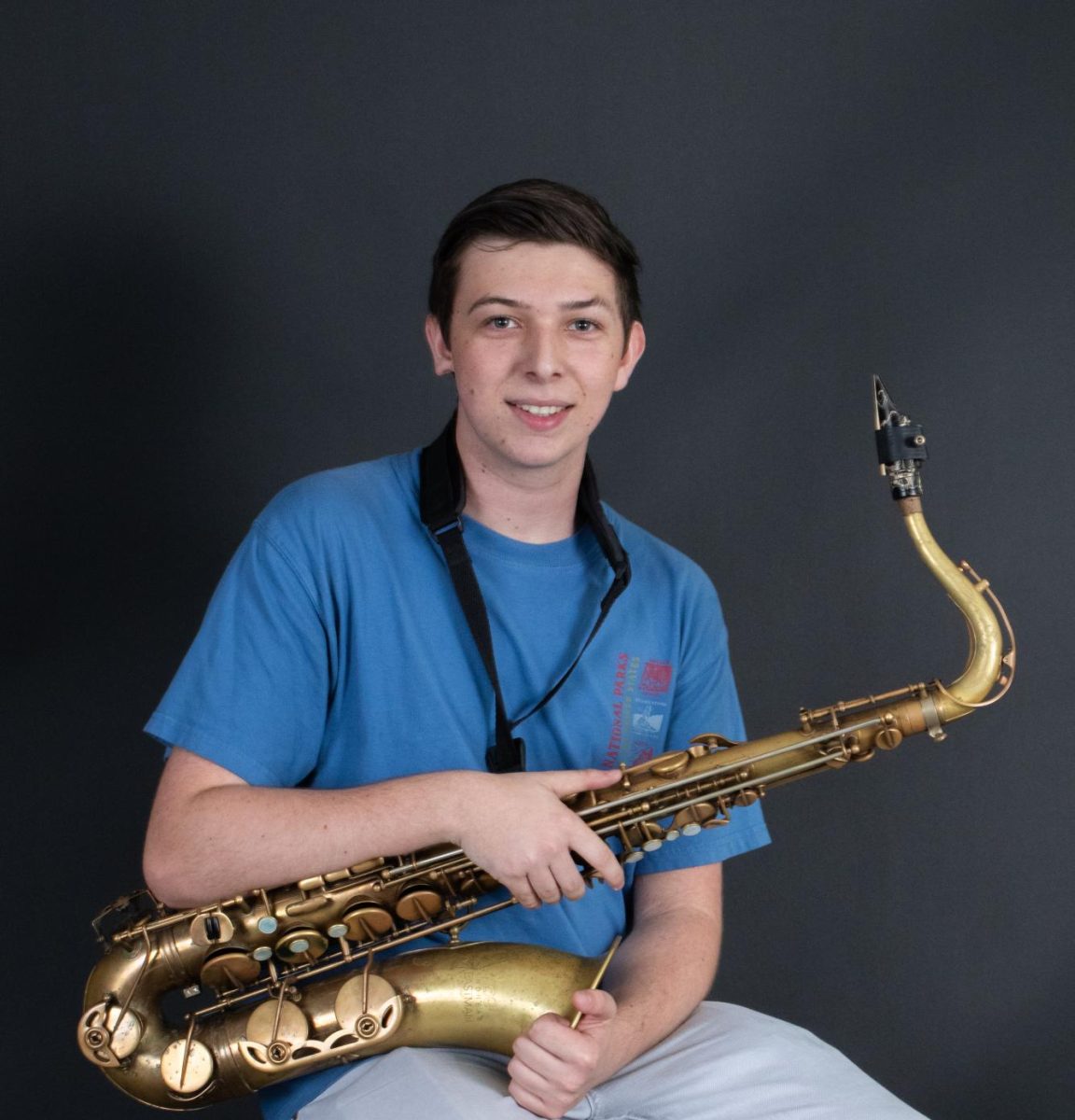 Band junior Anderson Spellman poses with his tenor saxophone.